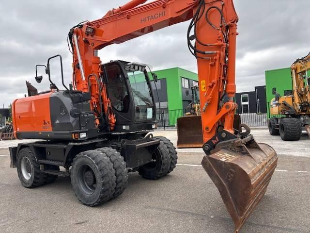 Hitachi ZX 140 W-5 Mobile excavator buy used in North