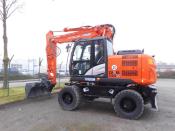 Hitachi ZX 140 W-5 + Verachtert SW + Verstellausleger