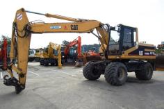 Caterpillar M 318 + Ballonreifen / Einfachbereifung