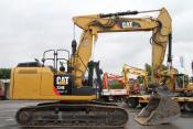 Caterpillar 324 E + OilQuick OQ70 + TL + Verstellausleger